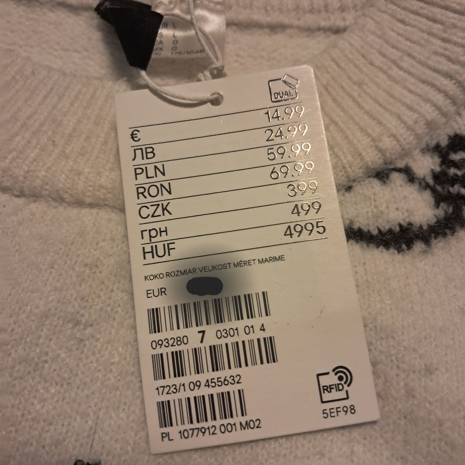 Śliczny sweterek w kotki firmy H&M rozm.M