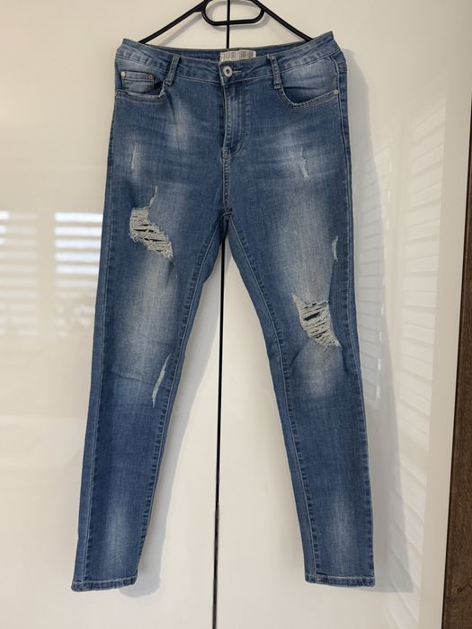 Jeansy damskie z rozdarciami rozmiar L