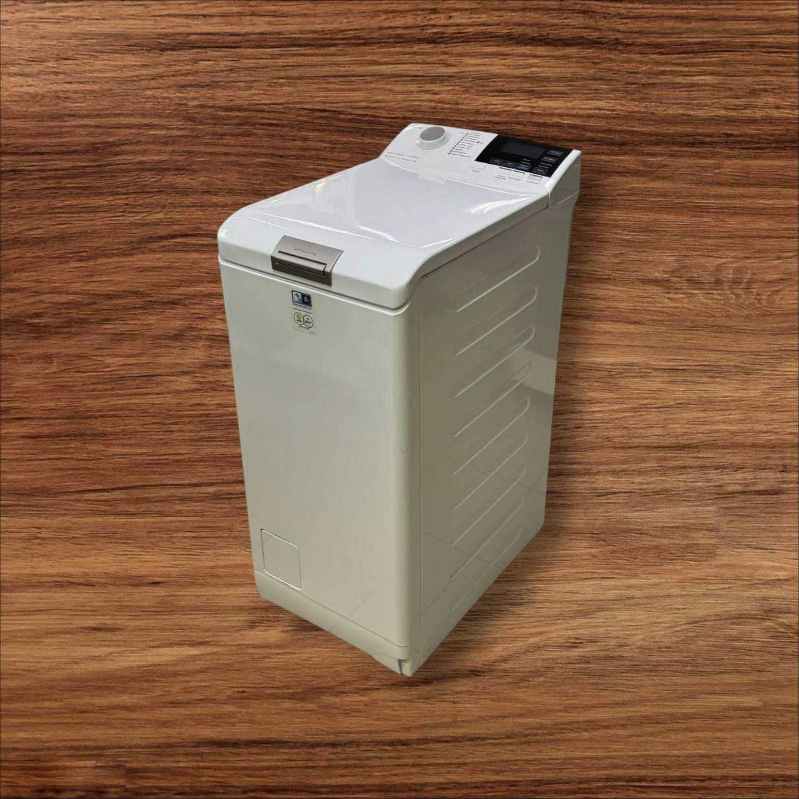 Пральна машина  бу AEG L6TB26TL 6 кг з вертикальним завантаженням