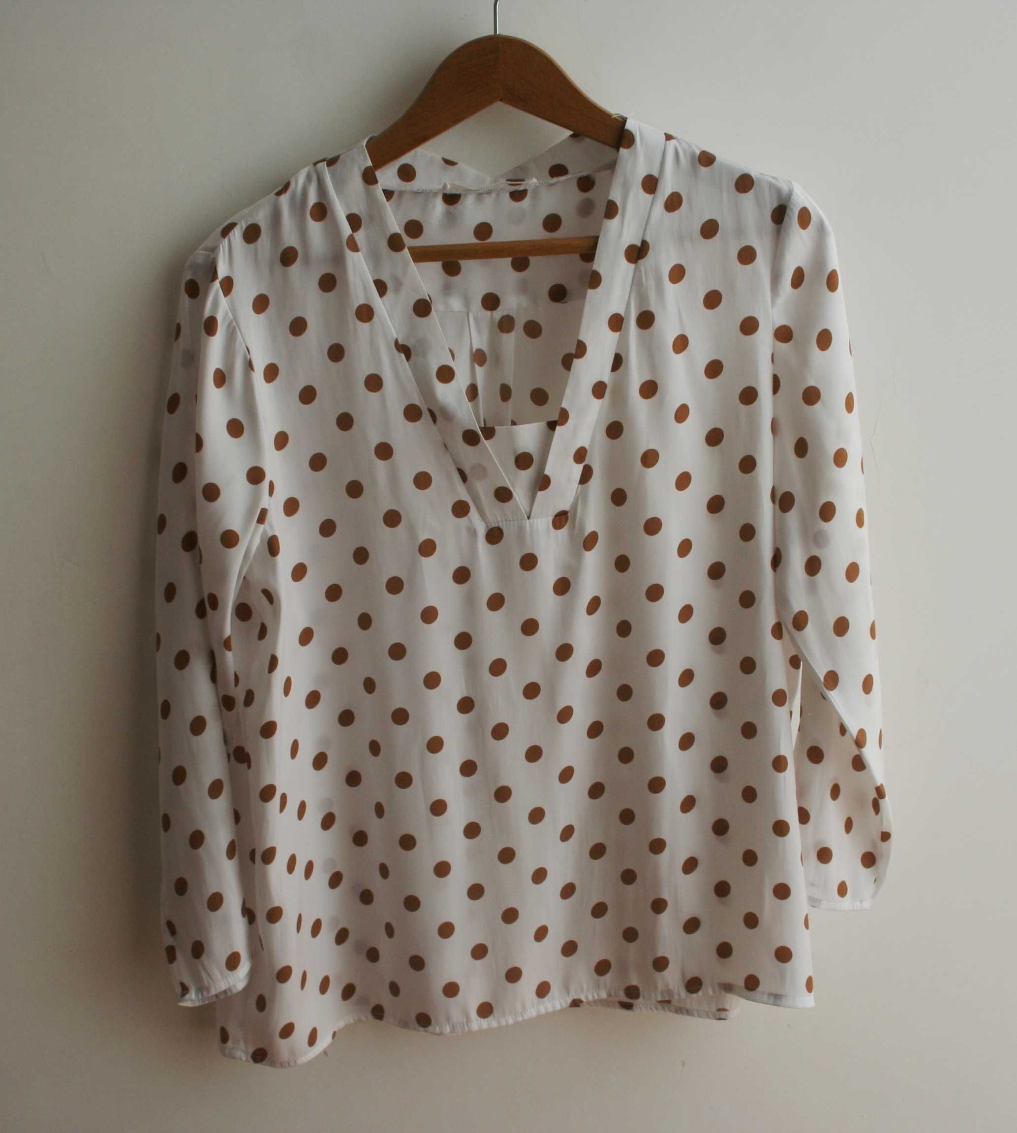 Blusa com bolas Sfera