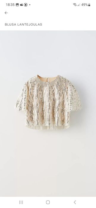 Blusa da menina com lantejoulas