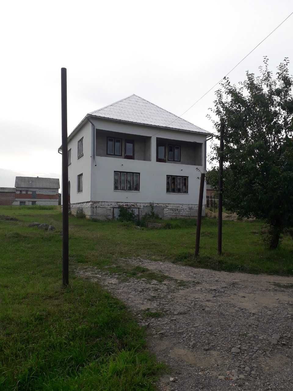 Продам будинок в с.Осій Хустського району на земельні ділянці 21 сот.