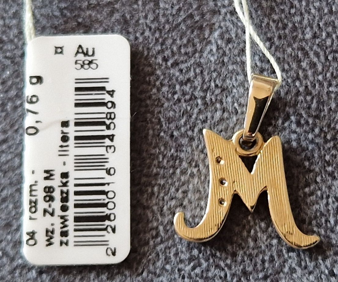 Nowa złota literka M firmy Apart pr. 585 z metką