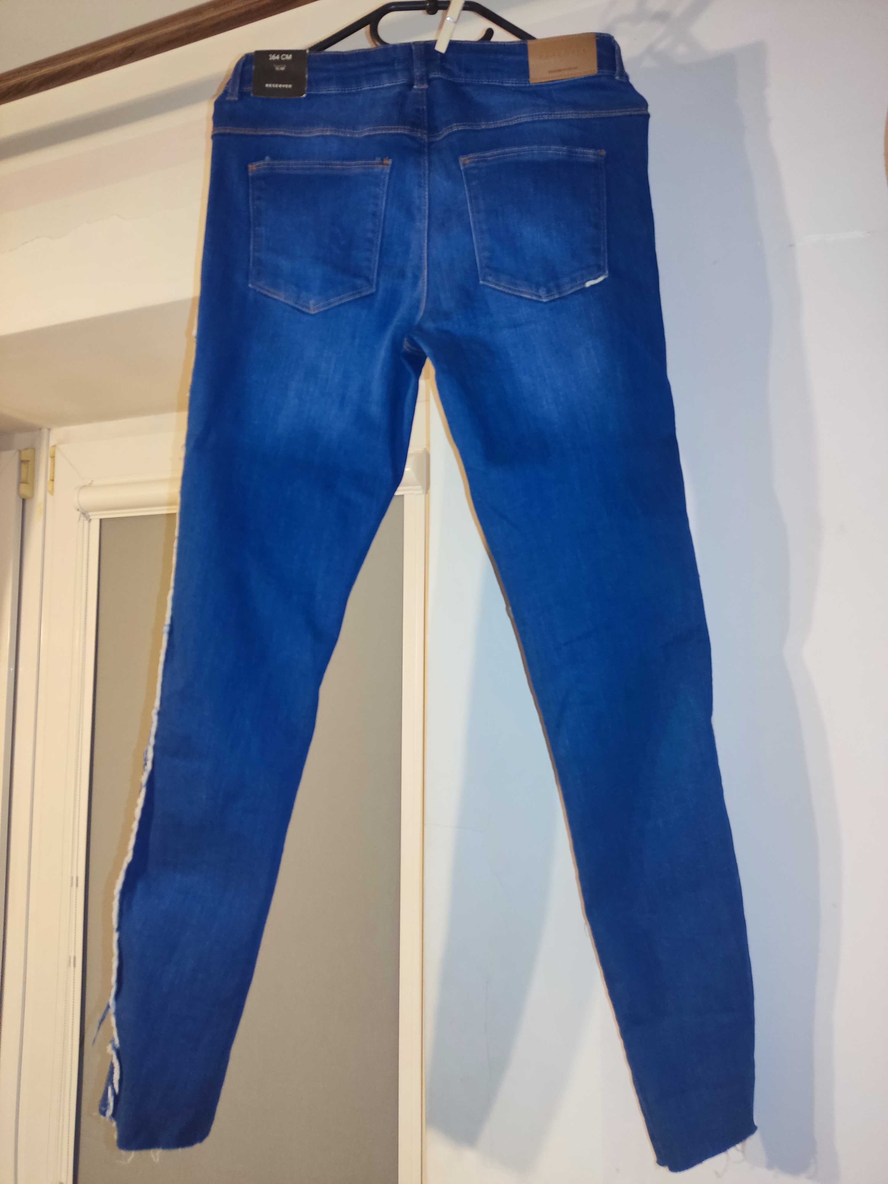 Nove spodnie jeansowe 164cm
