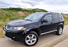 Mitsubishi Outlander 2.4i+Gaz Sekw. 4x4 7 Foteli NAVI+DVD HAK