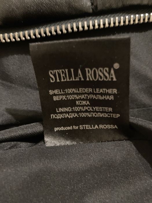 Жіноча шкіряна куртка на пух/перо,чорна,з капюшоном утеплений мутоном.