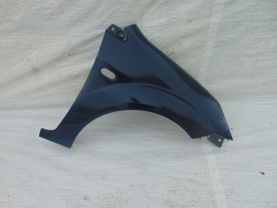 FORD FIESTA MK6 BŁOTNIK Prawy Przód Oryginał Części Opolskie 2006