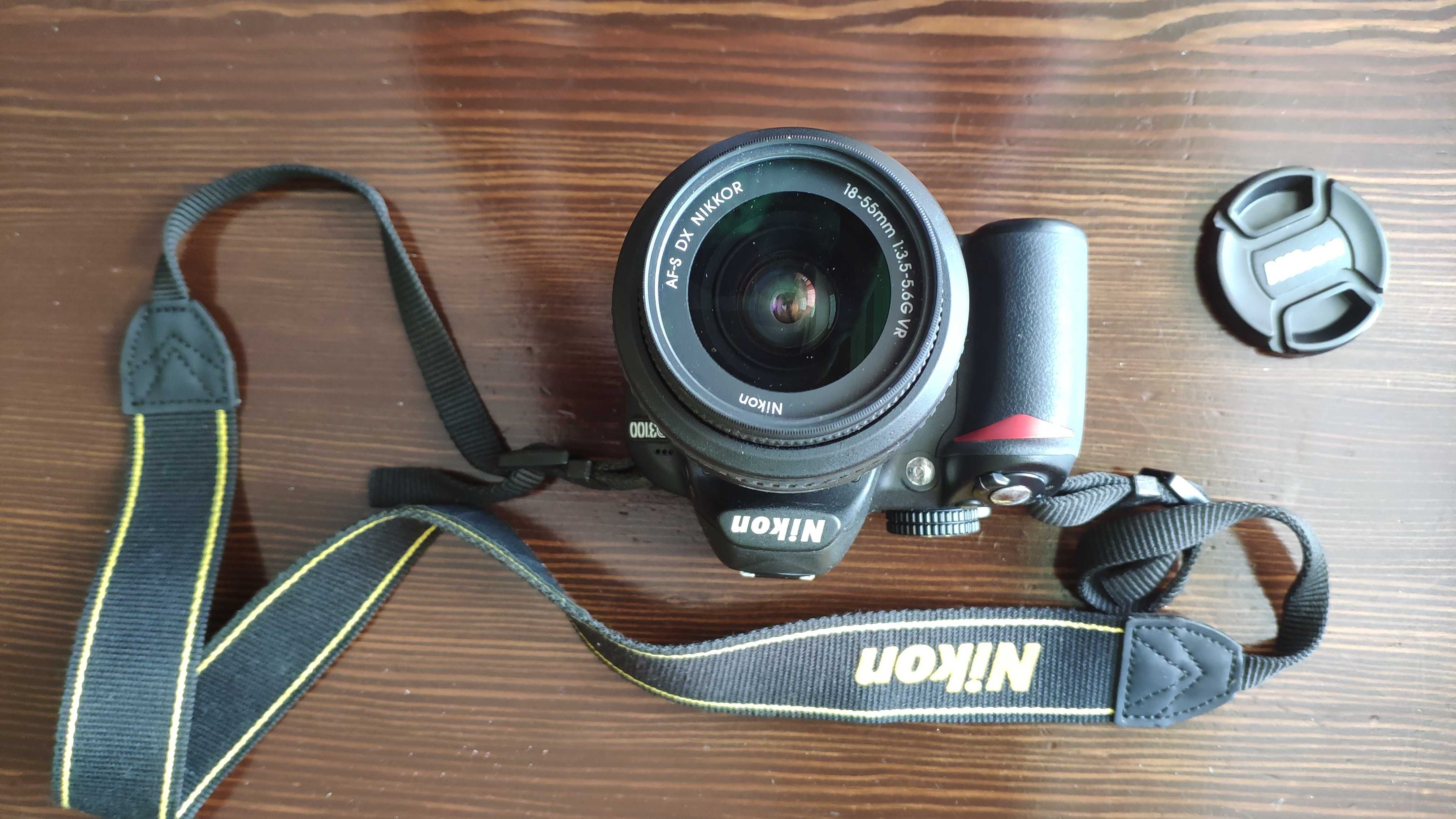 Продам фотоаппарат Nikon D3100 с мощным объективом