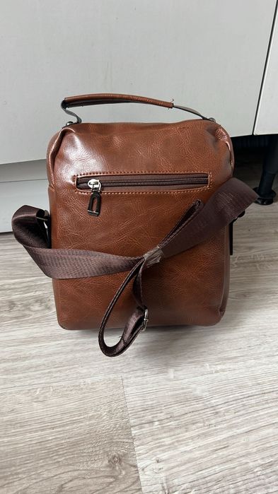 Brązowa torba męska na ramię wym.22*26*7 cm..