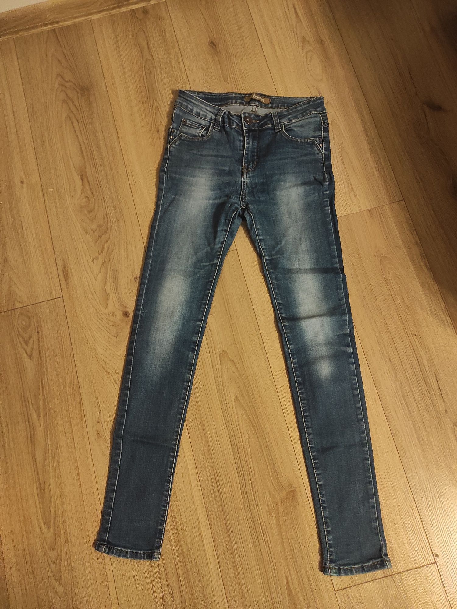 Spodnie jeans 36/38