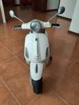 Scooter eléctrica para criança