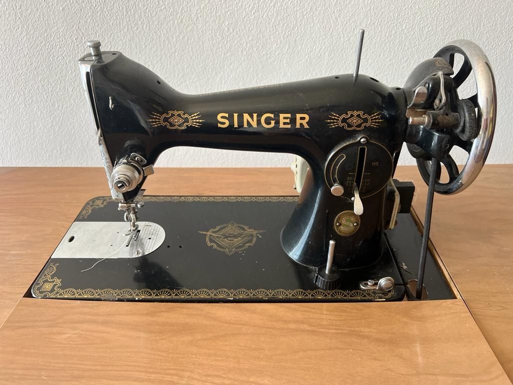 Máquina de costura singer