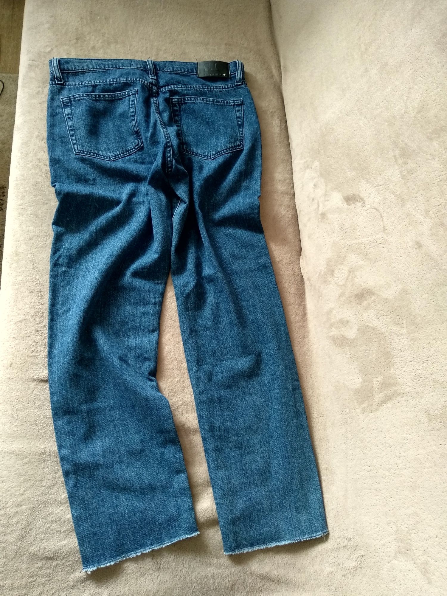 Spodnie jeansowe damskie firmy Top Secret rozmiar 38