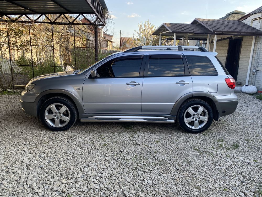 Mitsubishi outlander 2,4 АКПП газ/бензин