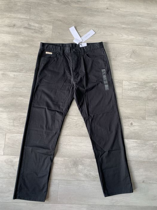 Spodnie meskie Calvin Klein chinosy 34W 30 L