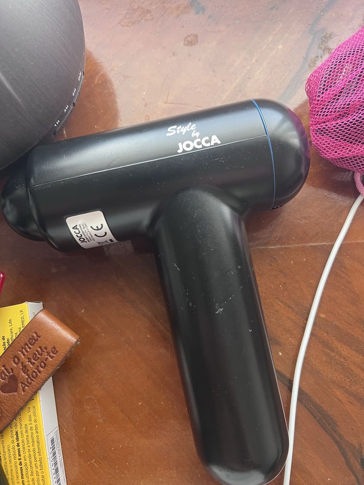 Pistola de massagem desportiva