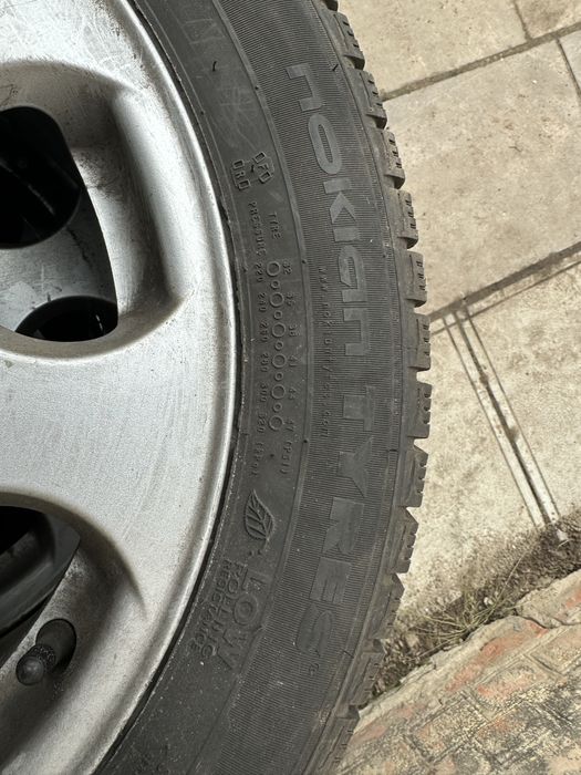Комплект дисків Audi і зимова гума Nordman R16