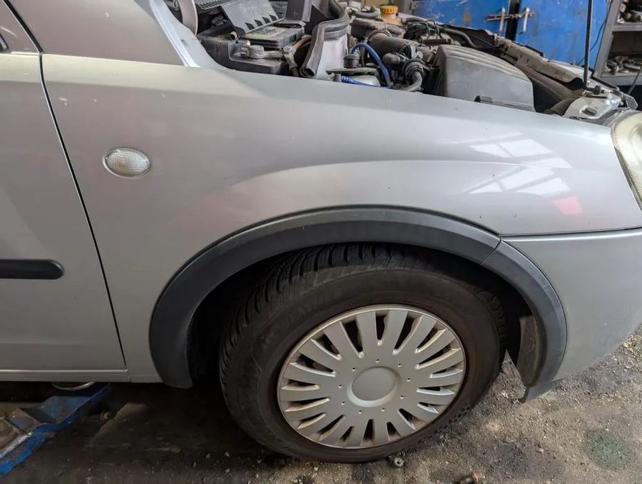 błotnik prawy przedni przód opel corsa c z157