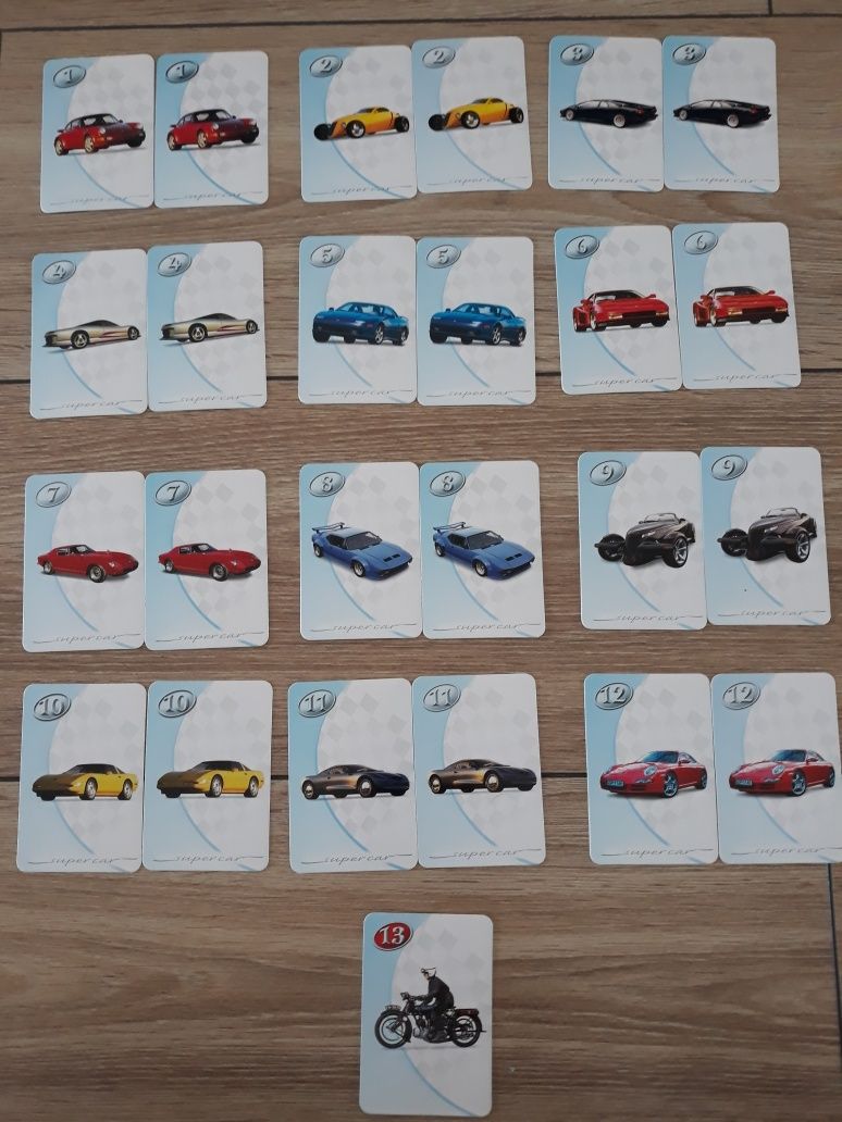 Aleksander  zestaw gier 4w1 auta, domino, puzzle, memory, Piotruś