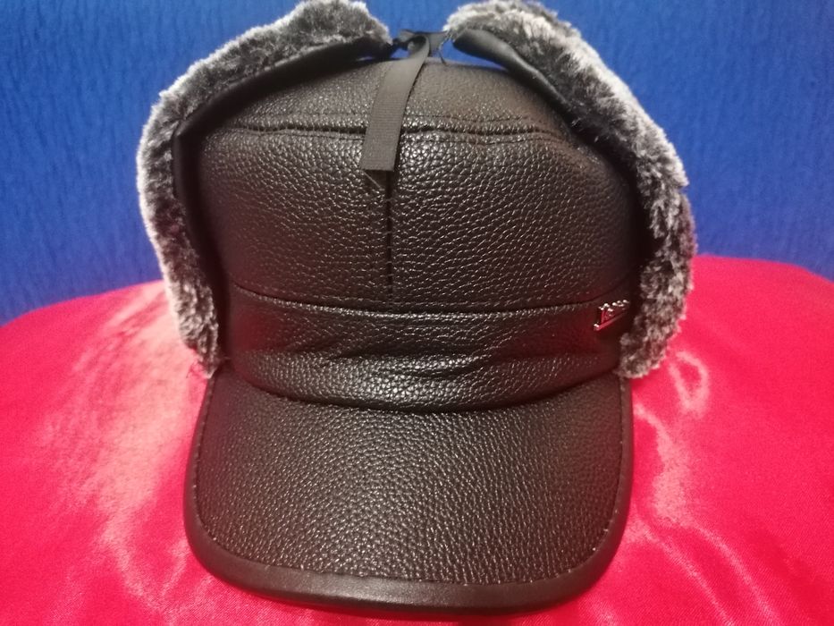 Продам мужскую зимнюю кепку с отложными ушками.