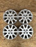 Диски4/100R16 ET45ЦО(діа)60.1 Nissan титани оригінал (легкосплавні)
