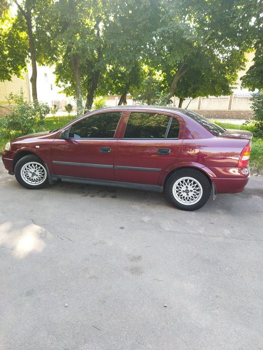 Опель Астра 1.4...