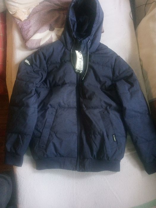 Продам новый мужской пуховик