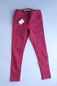 Dziewczęce spodnie jeansowe r.  140