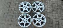 FELGI ALUMINIOWE 5x100 7Jx15 CALI ET28 fi 70.4/65.1 VW AUDI SEAT SKODA TOYOTA SUBARU KOMPET 4 SZTUKI TITAN