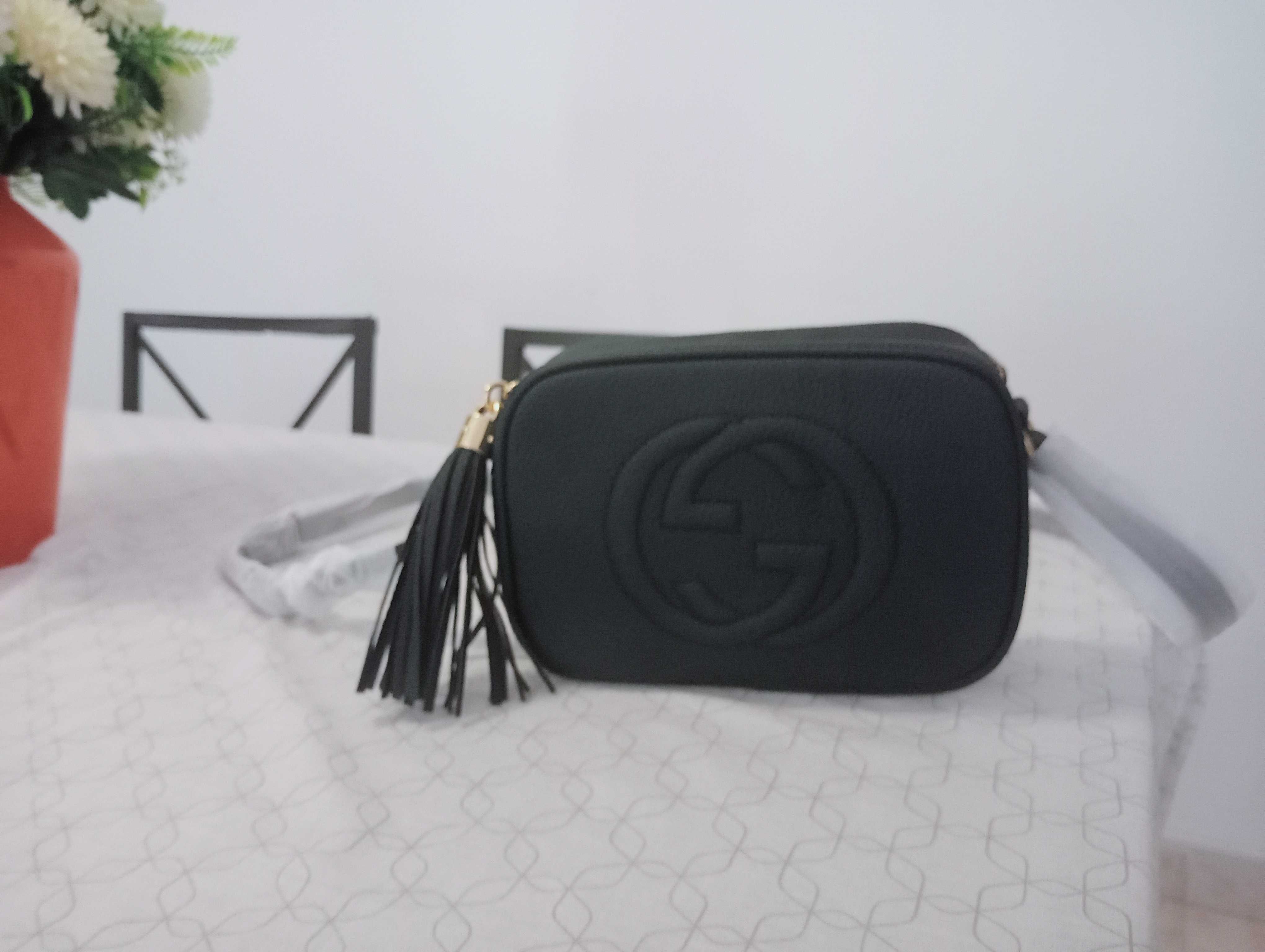 Mala Gucci entrego em mãos