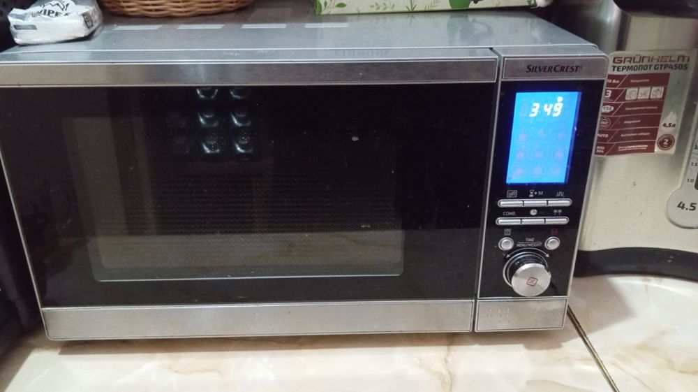 Мікрохвильова піч SilverCrest SMW 800 B2 на ремонт/деталі, робоча