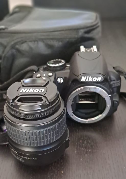 Nikon D3100 + objetiva