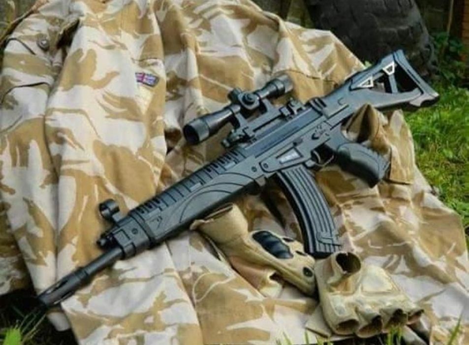Дитячий іграшковий автомат з лазерним прицілом на пульках