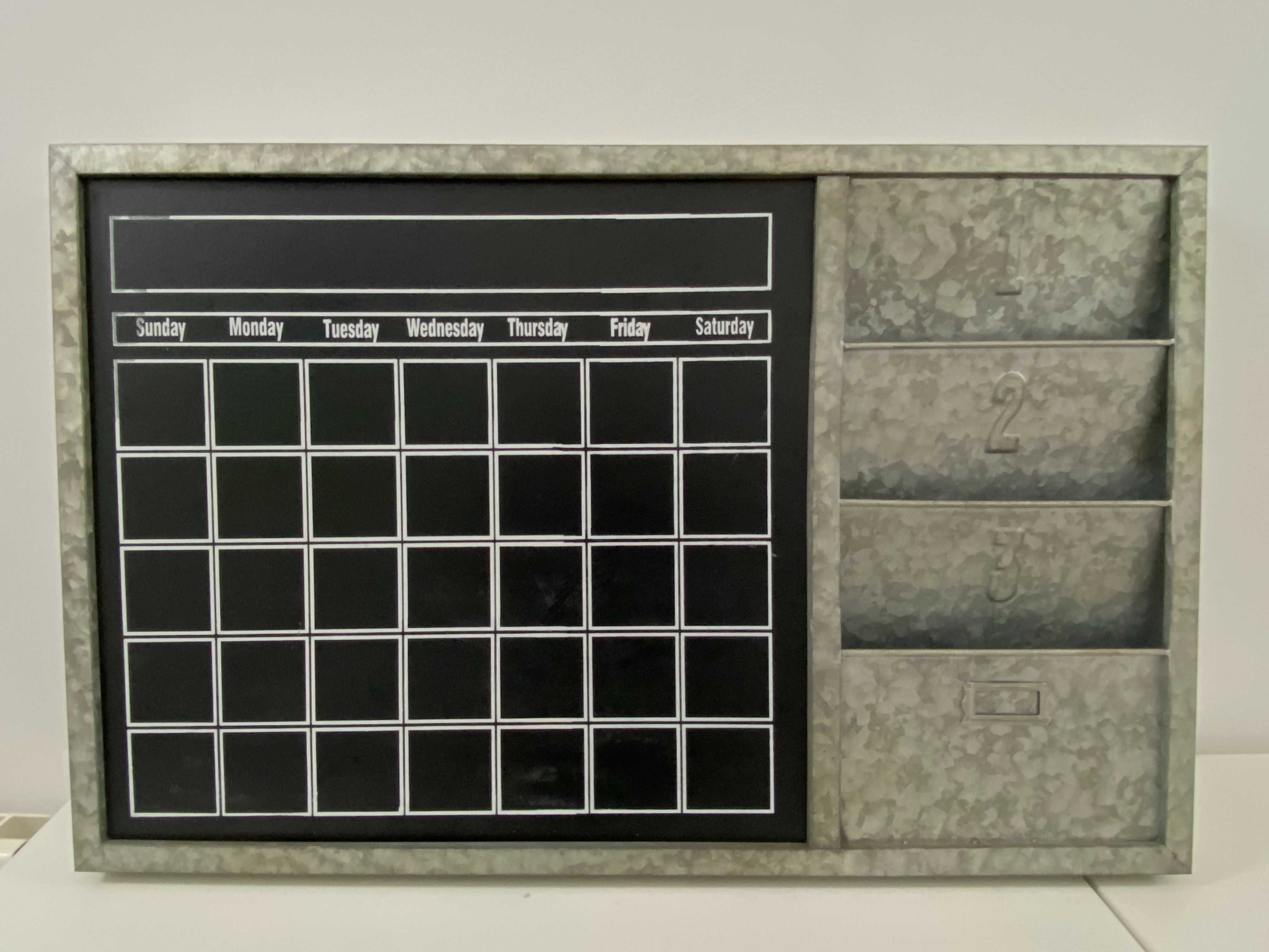 Quadro organizador galvanizado da loja do Gato Preto