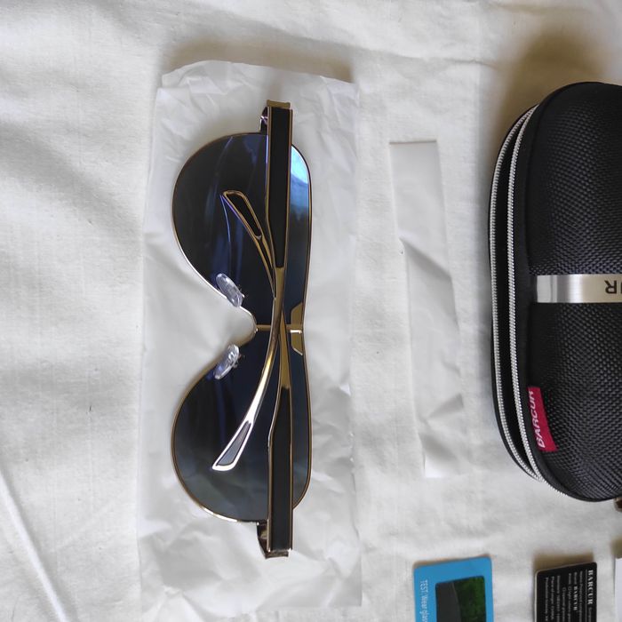 Солнцезащитные очки фирмы Barcur с поляризацией.