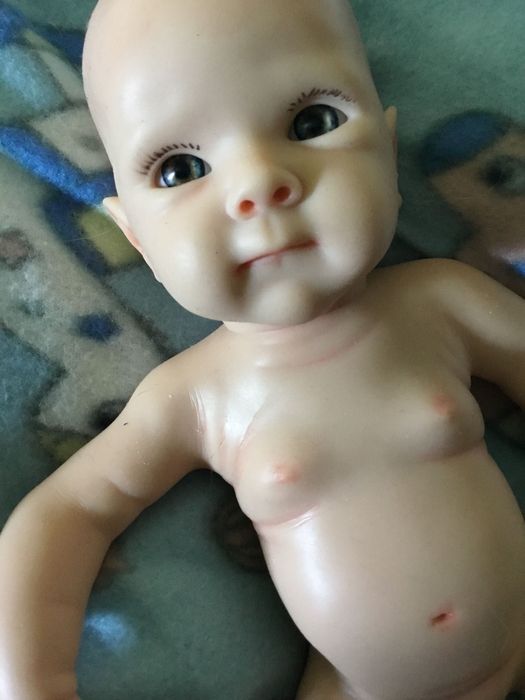 Boneca bebé reborn,verdadeiro silicone (artigos novos)