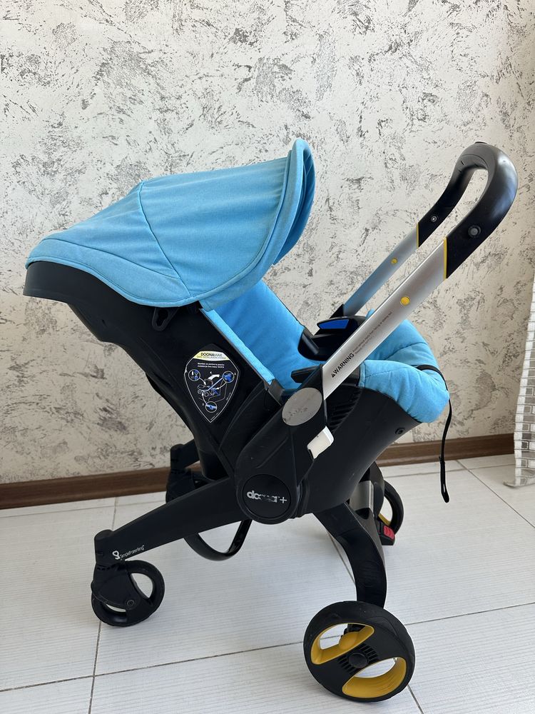 Автокрісло, коляска  ,візочок Doona