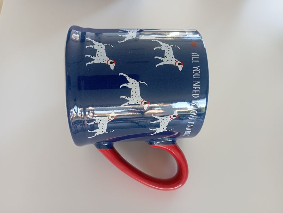 Kubek,nowy ceramiczny, wzór piesków.