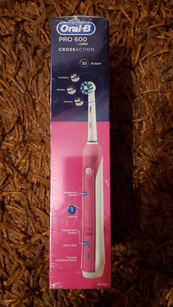 Elektryczna Szczoteczka  do zębów Oral-B pro 600 Braun , różowa .