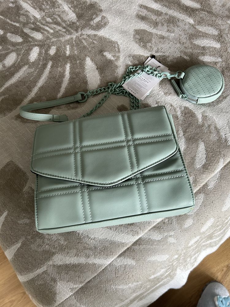 Bolsa tiracolo com moedeiro