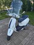 Szyba wysoka Vespa Primavera 50/125, uzywana, z mocowaniami