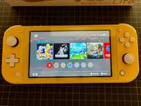 NINTENDO SWITCH LITE Żółty, stan 5/5 + folia + oryg. etui + SD64GB