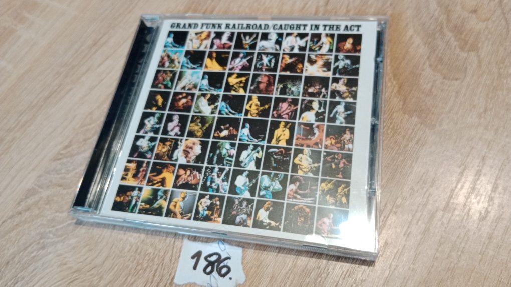 Grand Funk Railroad Caught in the act CD. 186.