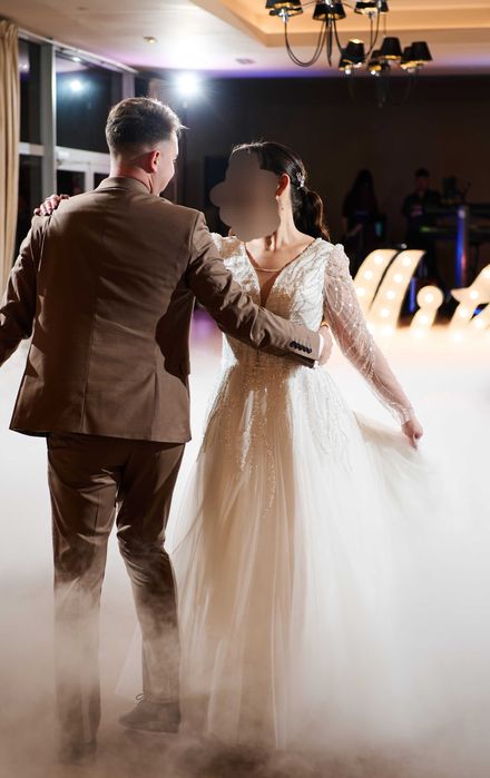 Suknia ślubna z długim rekawem