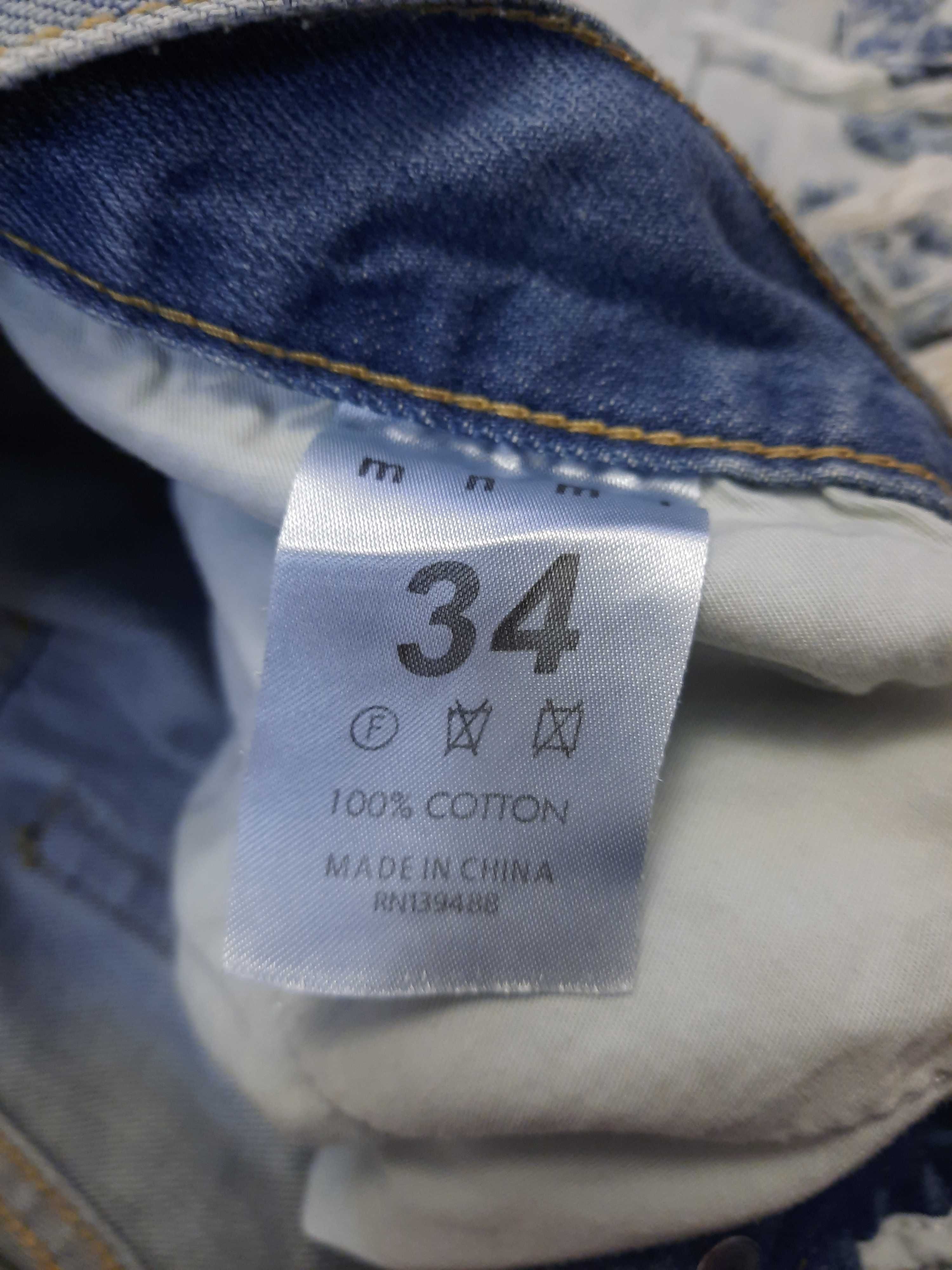 Spodnie jeansowe z rozdarciami jeansy Mnml rozmiar W34 L