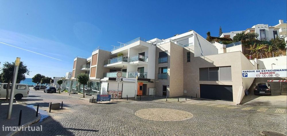 Apartamento com varanda na praia