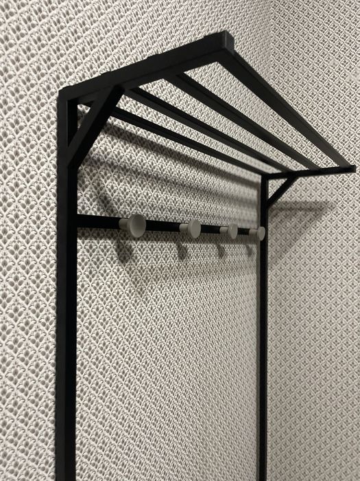 Вішалка з полицями для взуття, верхнього одягу, та головних уборів.