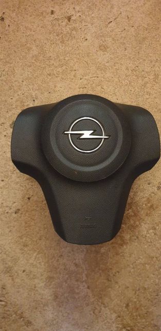 Подушка безопасности водителя Opel Corsa D (GM 13235770)