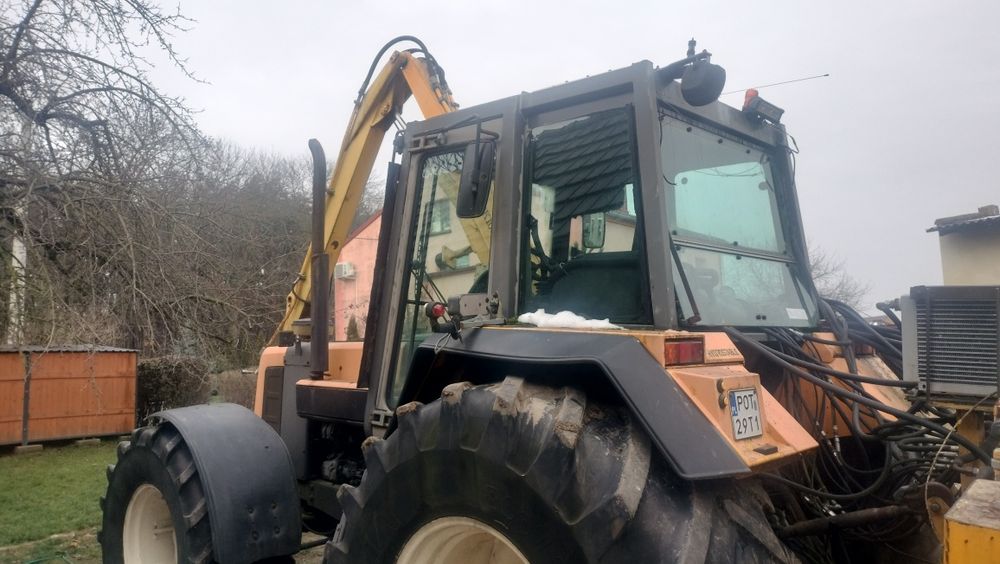 Renault 110.54 z ramieniem herder kosiarka wysięgnikowa do poboczy