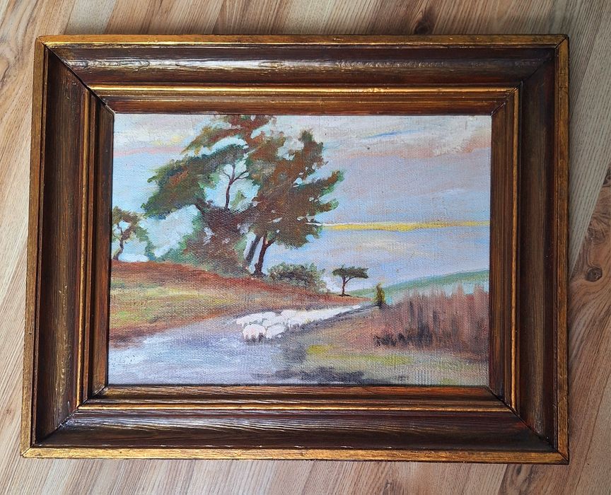 Obraz olejny w drewniane ramie.